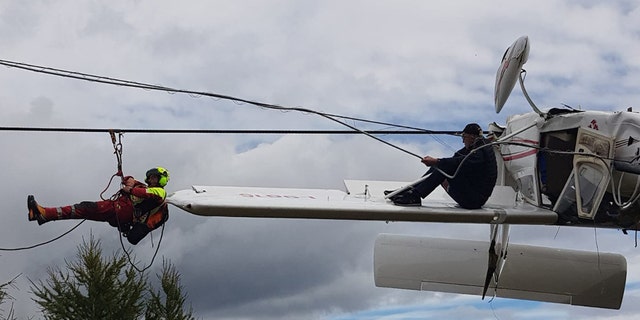 Several rescue teams were called to save the men, reportedly a 62-year-old pilot and 55-year-old Italian tourist.
