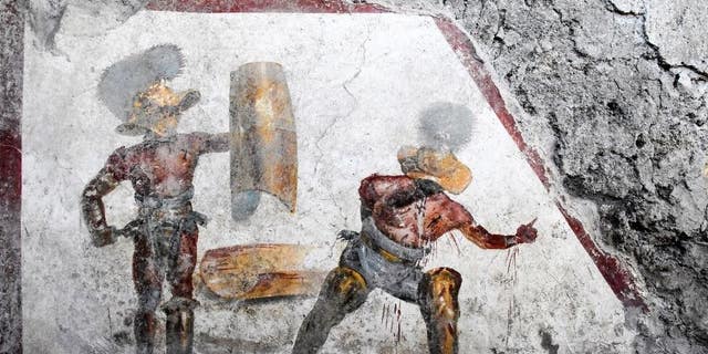 The fresco was found in what scientists believe was a tavern frequented by gladiators.