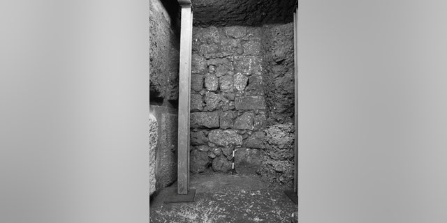 Researchers have now found more than 100 coins beneath the paving stones that date the street to around the year 31 A.D. (Credit: SWNS)