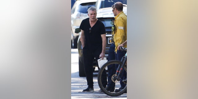 Ray Liotta talks with firefighters about the wildfires sweeping across Los Angeles.