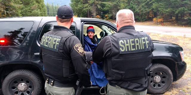 Campbell warming up after Marion County Sheriff’s deputies rescued him Friday. (Marion County Sheriff’s Office via AP)