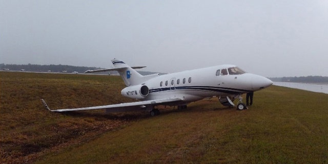 The plane’s crew declared an emergency shortly before 8:30 a.m., citing trouble with the nose gear.
