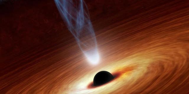 An artist’s concept illustrates a supermassive black hole. A new theoretical study outlines a method that could be used to search for wormholes in the background of supermassive black holes.