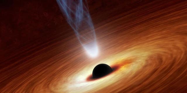 An artist’s concept illustrates a supermassive black hole. A new theoretical study outlines a method that could be used to search for wormholes in the background of supermassive black holes.