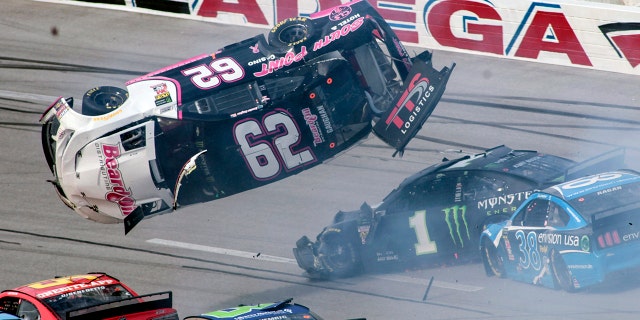 Brendan Gaughan (62) got flipped during a multi-car accident with six laps to go.