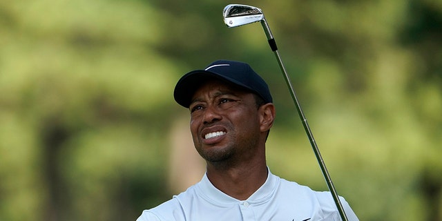 Tiger Woods of the United States watches his tee shot on the 5th hole during the second round of the Zozo Championship PGA Tour at the Accordia Golf Narashino country club in Inzai, east of Tokyo, Japan, Saturday, Oct. 26, 2019. (AP Photo/Lee Jin-man)