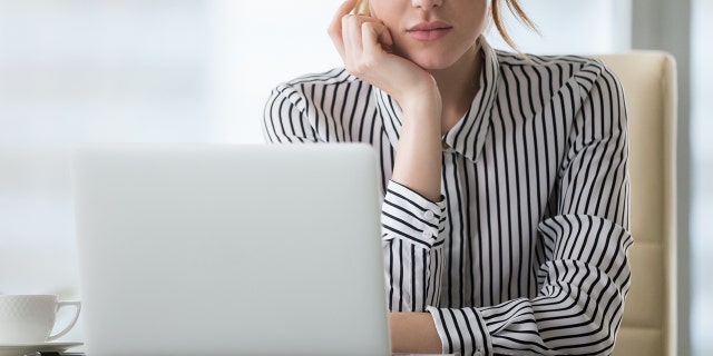 Person using computer.