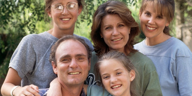 A cast photo from the 1988 film "Fatal Judgement," a made for TV movie based on the book "Fatal Dosage. Pictured from left is Jane Harnick (daughter, Laurie), Joe Regalbuto (as Charlie Capute), Crystal McKellar (as daughter, Mary), Patty Duke (as Anne Capute), Mary Tanner Bailey (as daughter Susan).