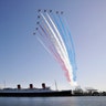 The Red Arrows, the British Royal Air Force aerobatic team, fly in formation over the historic Queen Mary ocean liner in Long Beach, California, Oct. 2, 2019. 