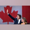 Liberal leader Justin Trudeau and wife Sophie Gregoire Trudeau wave after the Liberals won a minority government in Canada's general election in Montreal, Oct. 21, 2019.