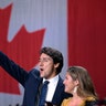 Liberal leader Justin Trudeau and wife Sophie Gregoire Trudeau wave after the Liberals won a minority government in Canada's general election in Montreal, Oct. 21, 2019.