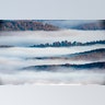 Morning mist covers the landscape near Kekesteto, Hungary, Oct. 17, 2019. 