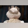 Britain's Queen Elizabeth II proceeds through the Royal Gallery before delivering the Queen's Speech at the State Opening of Parliament in London, Oct. 14, 2019. 
