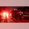Firefighters from Orange County await further instructions in a blackout during the Tick Fire, Thursday, Oct. 24, 2019, in Santa Clarita, Calif. The dramatic fires and evacuations — near Los Angeles and in the wine country of Northern California — came against a backdrop of power shutoffs that utility companies said were necessary to stop high winds from toppling trees or blowing debris into power lines and starting fires. (AP Photo/ Christian Monterrosa)