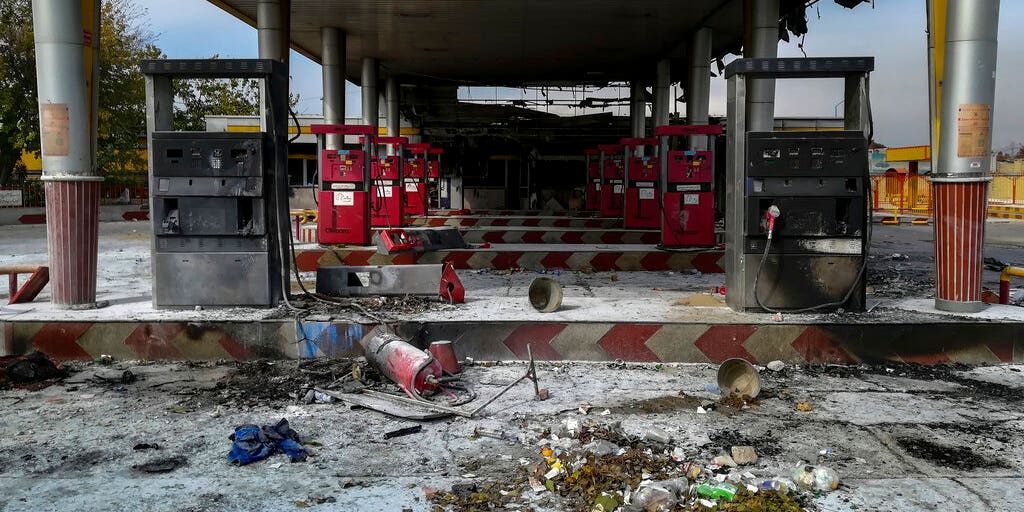 Iran's security forces shot and killed 'rioters' in gas price protests, state TV reports