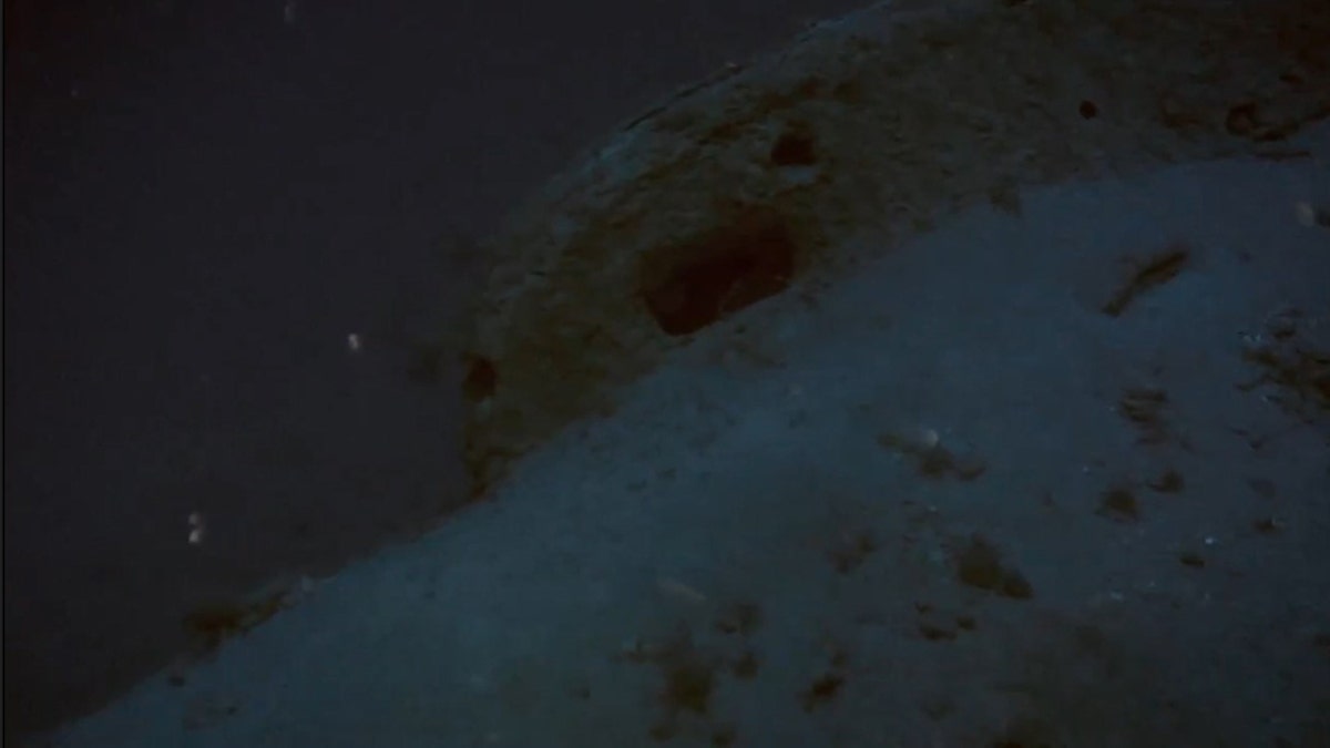 The submarine is resting in 427 feet of water.