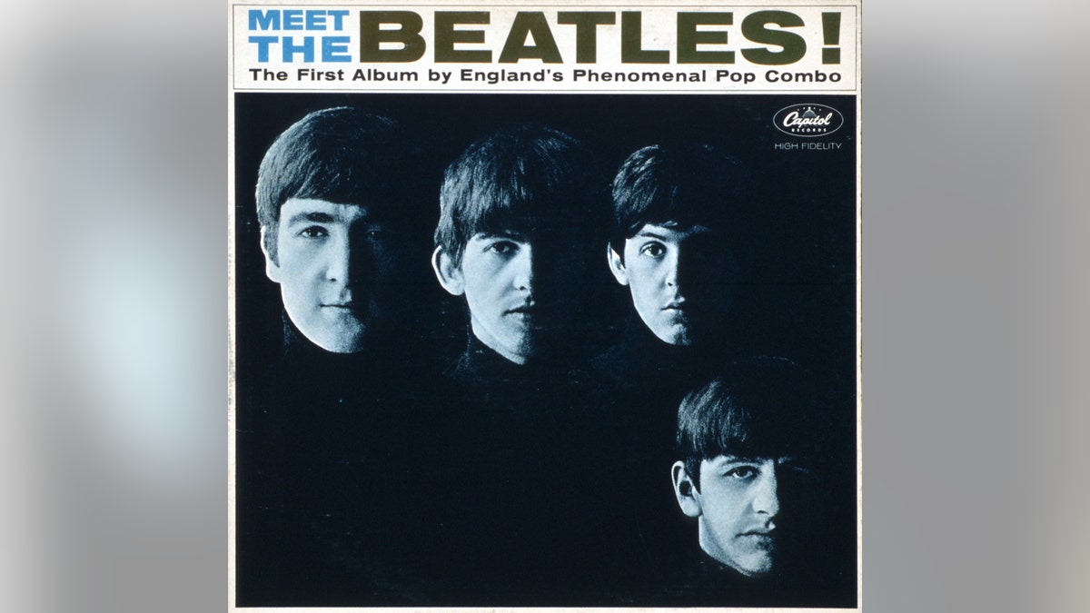 (L-R) John Lennon, George Harrison, Paul McCartney, Ringo Starr. Photographed by Robert Freeman