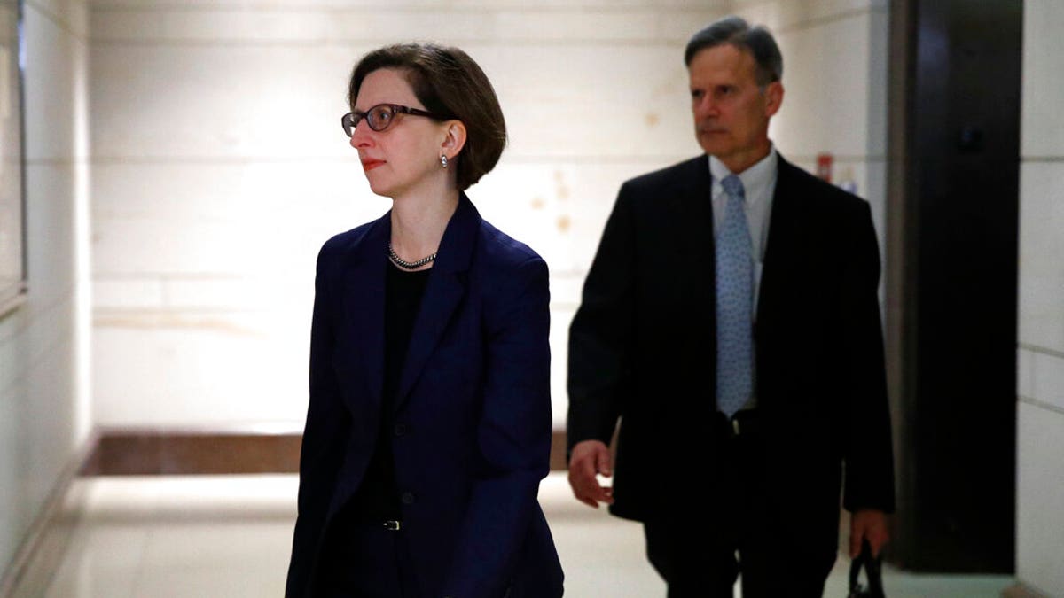 Deputy Assistant Secretary of Defense Laura Cooper, left, on Capitol Hill on Oct. 30. (AP Photo/Patrick Semansky, File)