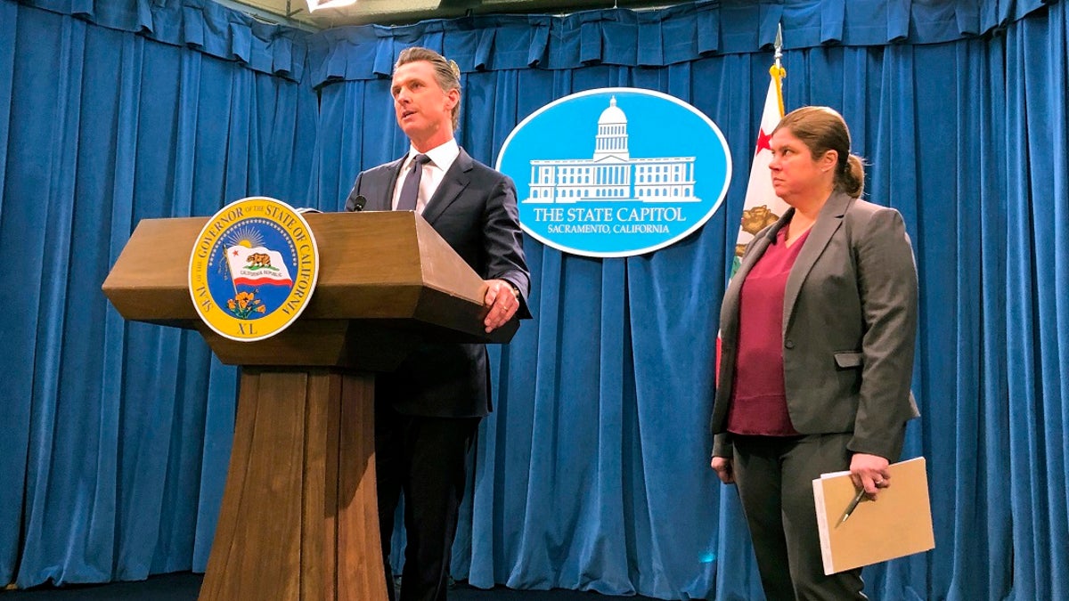California Gov. Gavin Newsom announces the appointment of Ana Matosantos as California's "energy czar" on Friday. (AP Photo/Adam Beam)