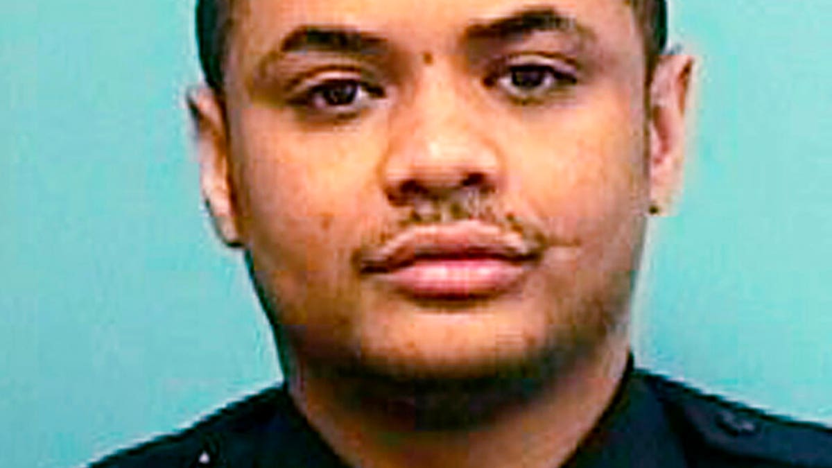 This undated file photo provided by the Baltimore Police Department shows Det. Sean Suiter. (Baltimore Police Department via AP, File)