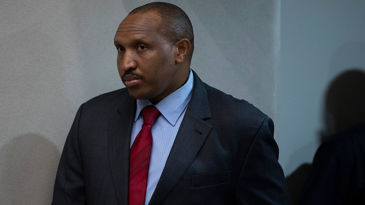 Congolese militia commander Bosco Ntaganda enters the courtroom of the International Criminal Court, or ICC, to hear the sentence in his trial in The Hague, Netherlands, Thursday, Nov. 7, 2019. (AP Photo/Peter Dejong, Pool)