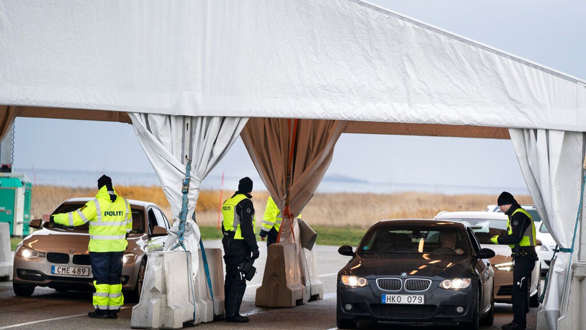 Danish police check travellers from Sweden, near the Highway coming out of the Tunnel near Copenhagen, Denmark.