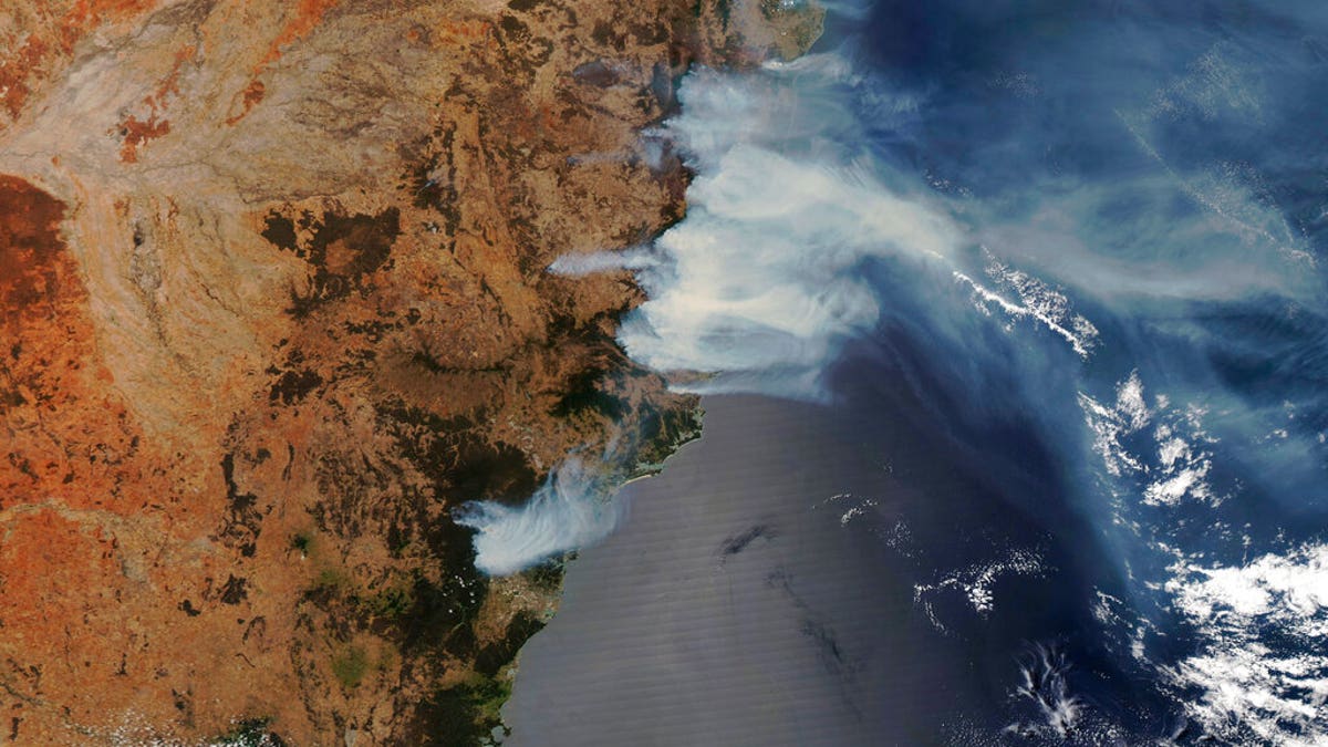 This NASA Modis satellite image provided by Maxar shows smoke from wildfires burning in New South Wales, Australia, Thursday, Nov. 14, 2019.