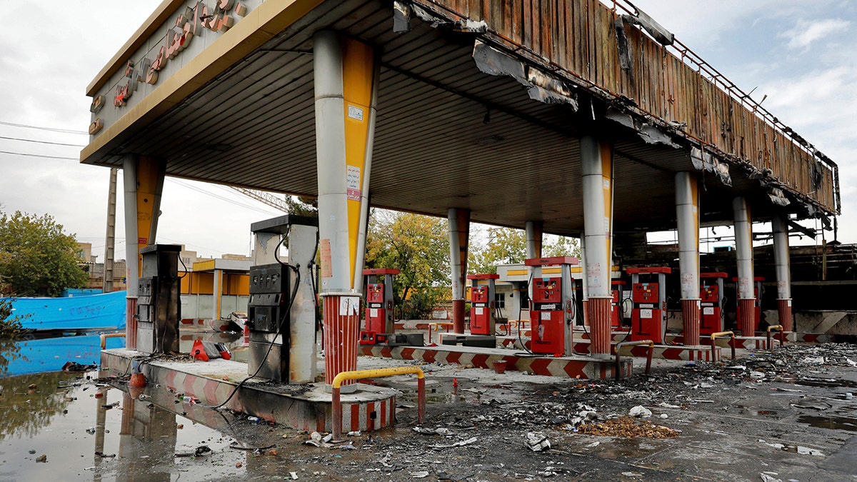 A gas station shows damages after it was attacked and burned during protests over rises in government-set gasoline prices, in Tehran, Iran, Wednesday, Nov. 20, 2019. Demonstrations struck at least 100 cities and towns, spiraling into violence that saw banks, stores and police stations attacked and burned. 