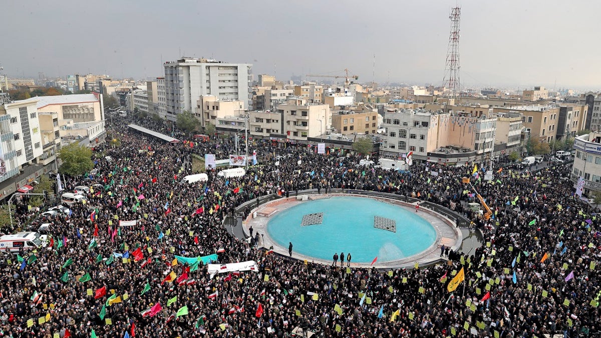 Demonstrators attend a pro-government rally organized by authorities in Iran denouncing last week’s violent protests over a fuel price hike, in Tehran on Monday. (AP Photo/Ebrahim Noroozi)