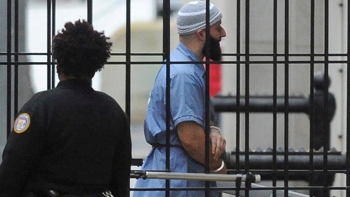 Adnan Syed enters a Baltimore courthouse prior to a 2016 hearing in his case. (Barbara Haddock Taylor/The Baltimore Sun via AP)