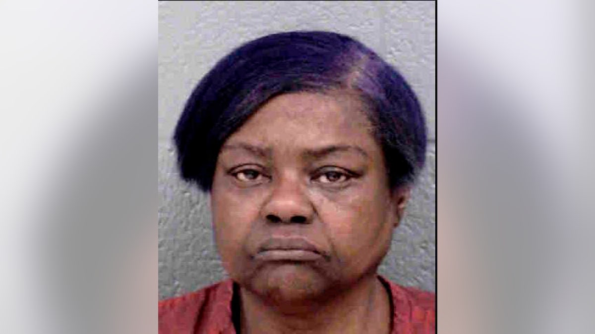 Police say Elvira Elizabeth Alexander is charged with murder and possession of a stolen firearm in the shooting death of her daughter on Thanksgiving Day. 