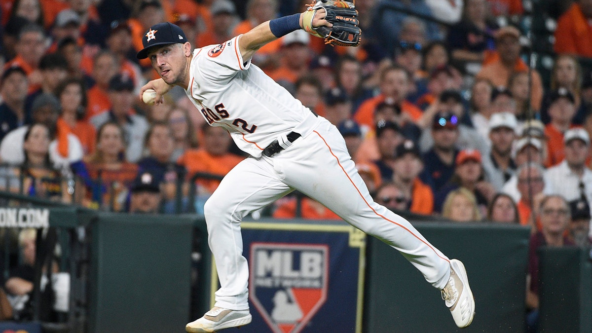 FILE - In this Oct. 4, 2019, file photo, Houston Astros third baseman Alex Bregman looks to first after fielding a grounder by Tampa Bay Rays' Tommy Pham, who was safe at first in the seventh inning during Game 1 of a baseball American League Division Series in Houston. If Bregman is the American League’s Most Valuable Player when the voting is announced Thursday, Nov. 14, the Astros will become the first team to have an MVP, Cy Young Award winner and Rookie of the Year in the same season. Justin Verlander took Cy Young honors, and Yordan Alvarez was picked as the AL’s top rookie. AP Photo/Eric Christian Smith, File)