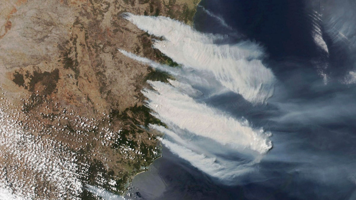 This Nov. 8, 2019, satellite photo taken by NASA shows hot, dry and windy weather conditions as bushfires burn in the eastern part of News South Wales state.