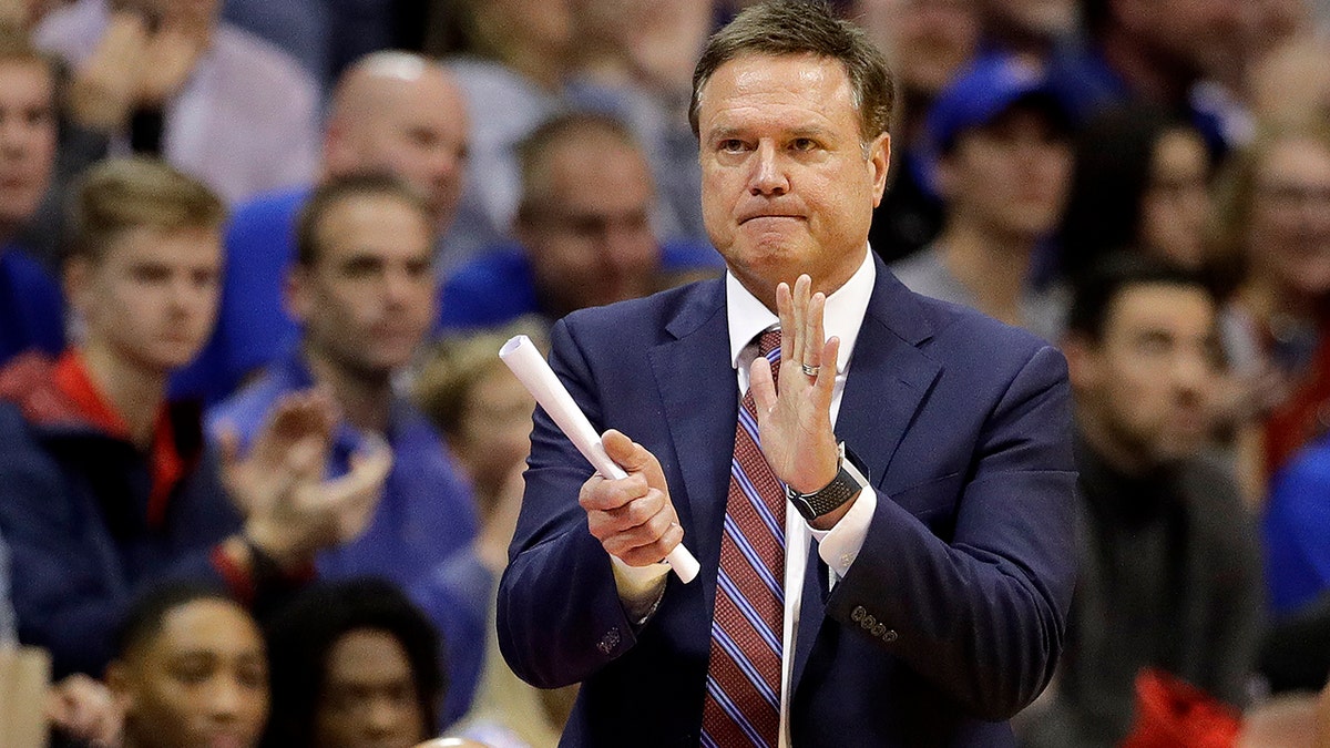 Kansas coach Bill Self talks to his players during the second half of the team's NCAA college basketball game against UNC Greensboro on Friday, Nov. 8, 2019, in Lawrence, Kan. Kansas won 74-62. (AP Photo/Charlie Riedel)