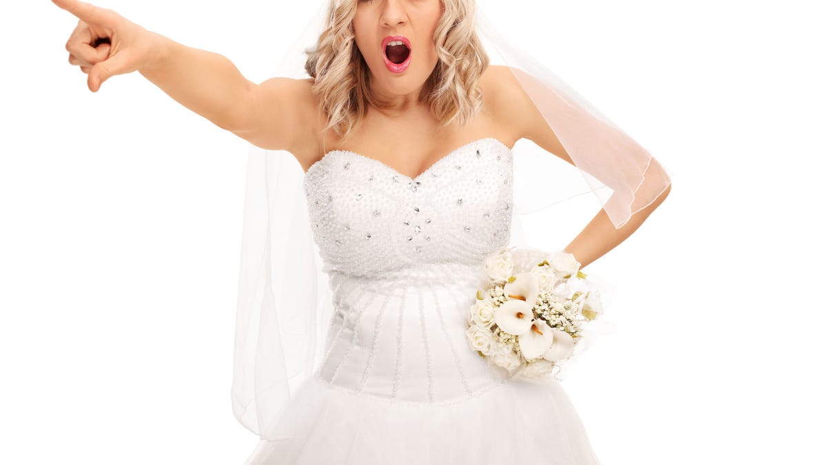 Angry bride pointing with her finger