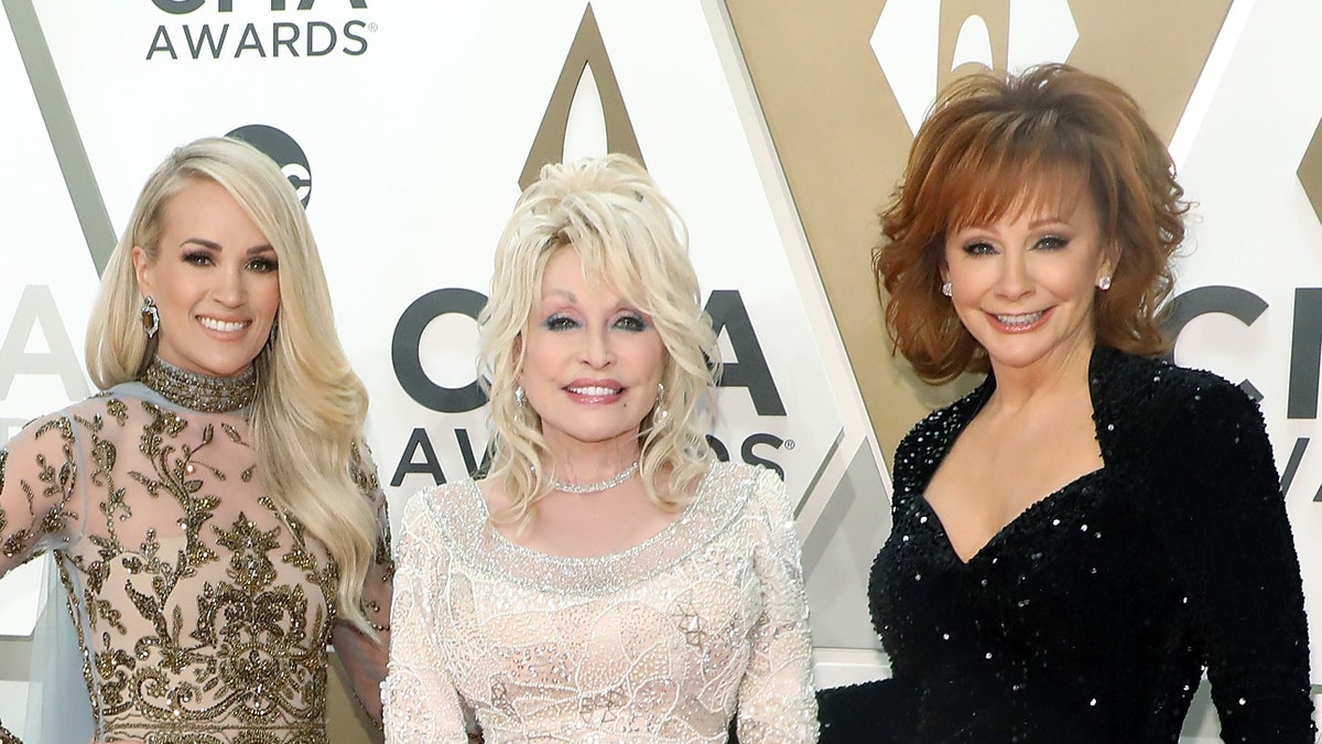 Reba McEntire attends the 53rd annual CMA Awards in 2019 alongside Carrie Underwood and Dolly Parton. In 2020, the singer revealed she is dating actor Rex Linn.