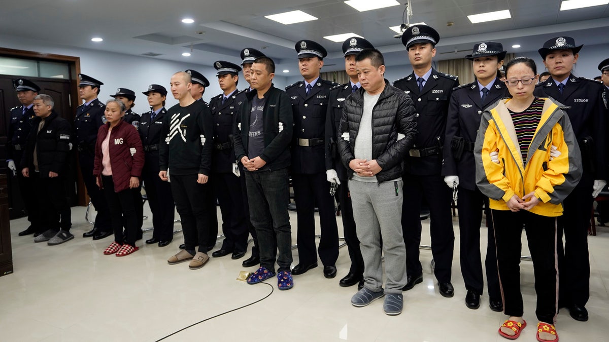 The court sentenced nine fentanyl traffickers Thursday in a case that was a culmination of a rare collaboration between Chinese and U.S. law enforcement to crack down on global networks that manufacture and distribute lethal synthetic opioids.