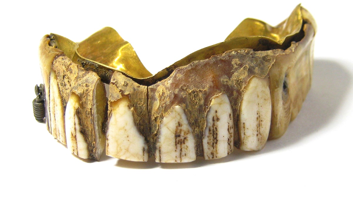 The 200-year-old false teeth were found in a field in Southern England. (Hansons Auctioneers and Valuers)