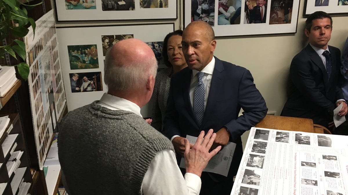 Newly announced Democratic presidential candidate and former Massachusetts Gov. Deval Patrick speaks with New Hampshire Secretary of State Bill Gardner as he files to place his name on the first-in-the-nation presidential primary ballot, in Concord, NH on Nov. 14, 2019