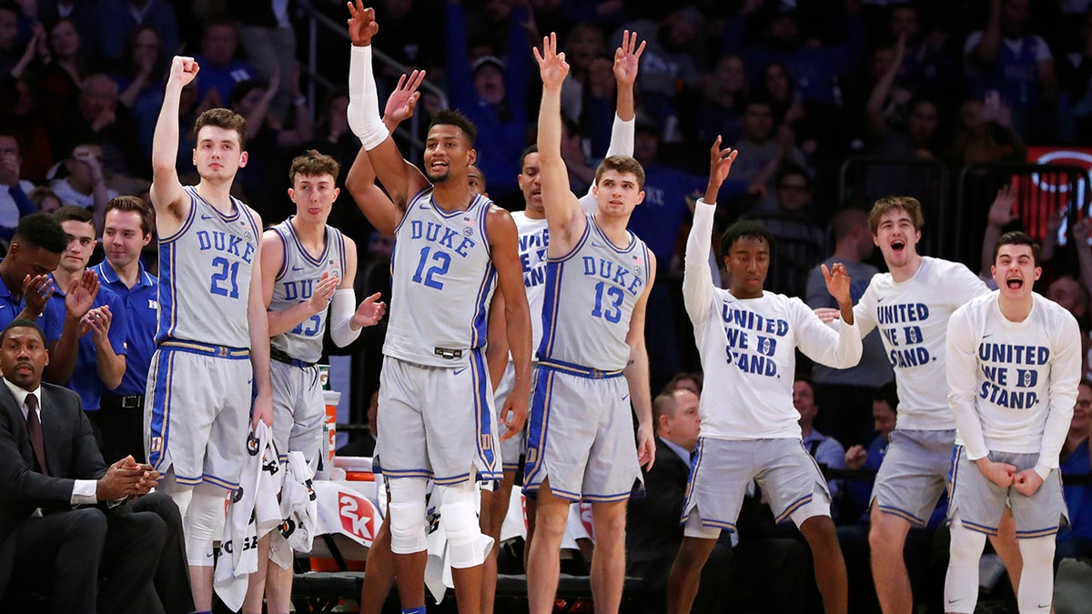 Duke players react from the bench during the first half of the first round of the 2K Empire Classic NCAA college basketball tournament against California, Thursday, Nov. 21, 2019, in New York. (AP Photo/Kathy Willens)