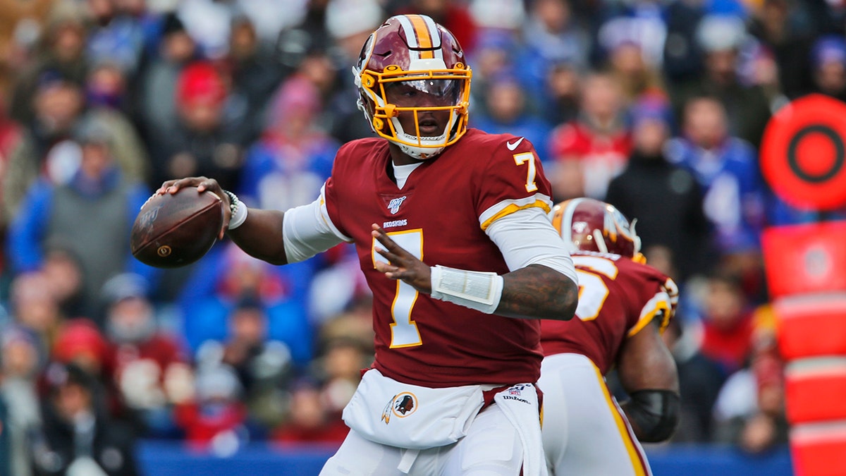 FILE - In this Nov. 3, 2019, file photo, Washington Redskins quarterback Dwayne Haskins looks to throw during the first half of an NFL football game against the Buffalo Bills, in Orchard Park, N.Y. The Redskins at the bye week of a lost season are a team without a definitive answer at quarterback, answers to questions on offense and defense and a visible organizational plan for the future. (AP Photo/John Munson, File)