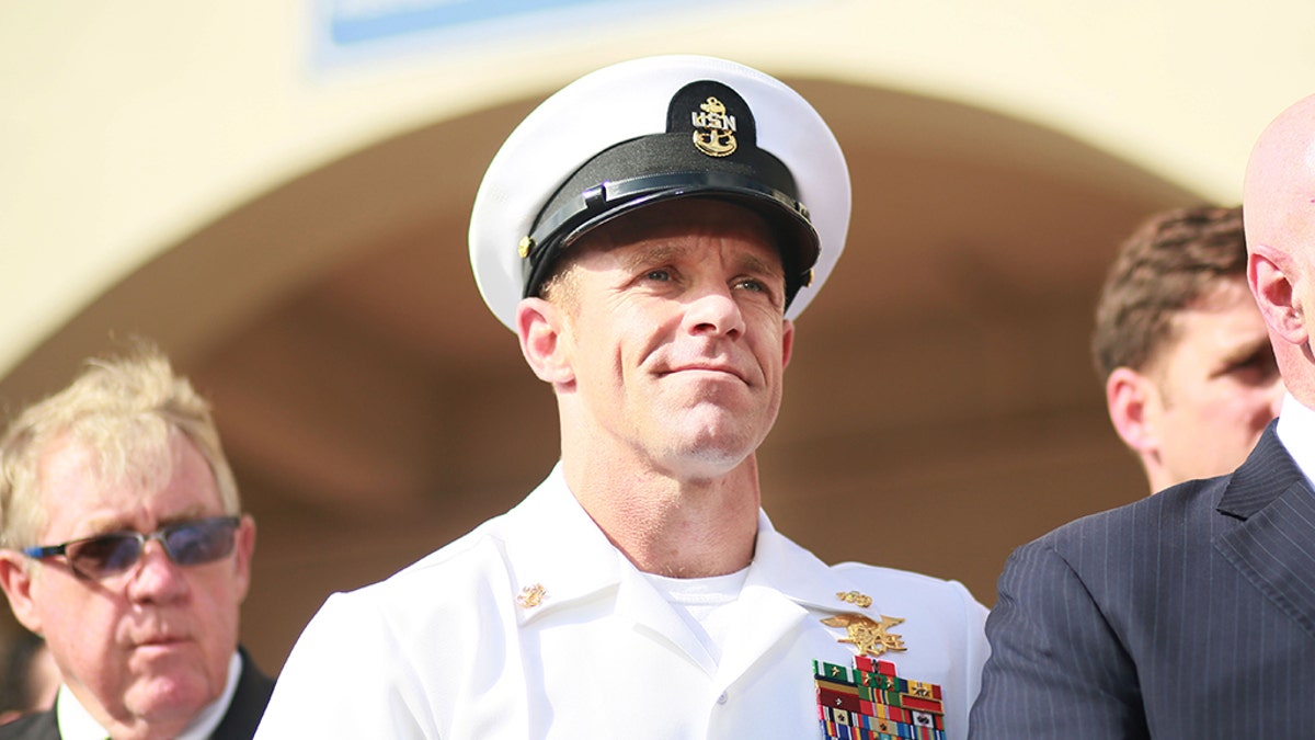 Navy Special Operations Chief Edward Gallagher celebrates after being acquitted of premeditated murder at Naval Base San Diego, Calif., on July 2, 2019. (Photo by Sandy Huffaker/Getty Images)