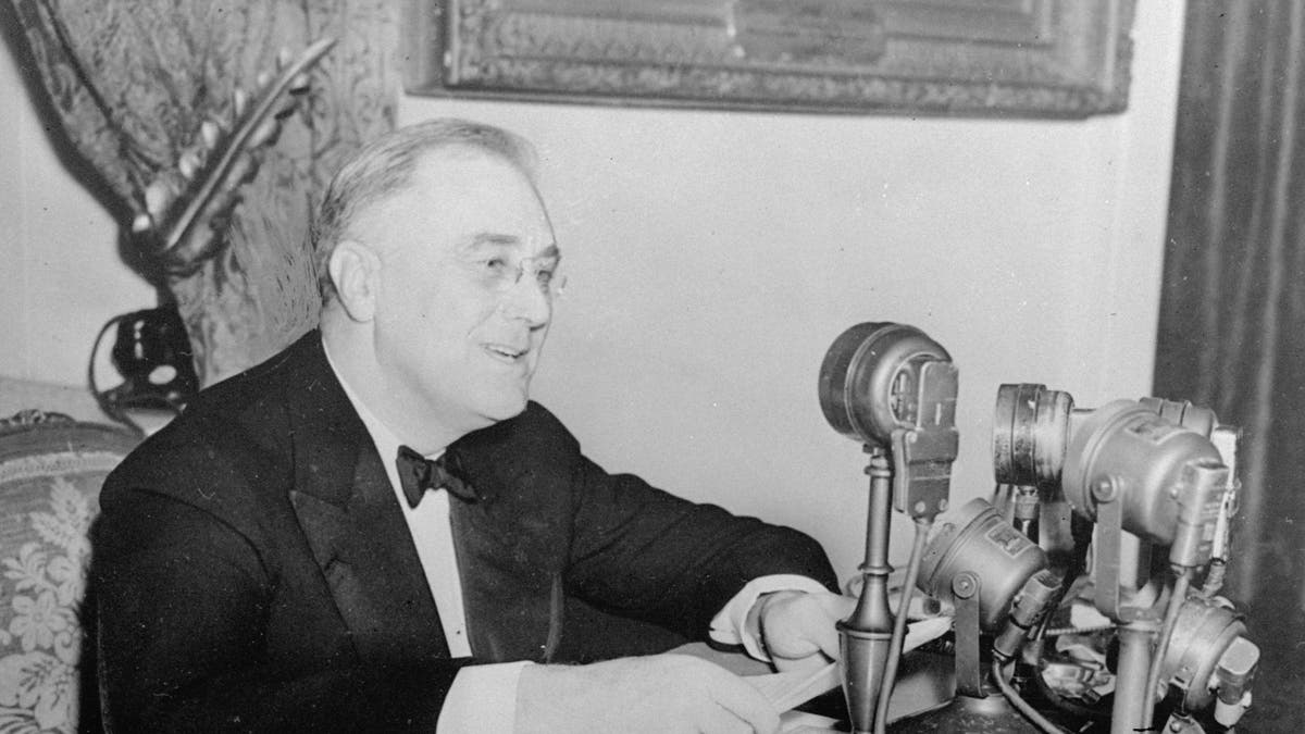 President Franklin D. Roosevelt talks to the nation in a fireside chat from the White House in this November 1937 photo.
