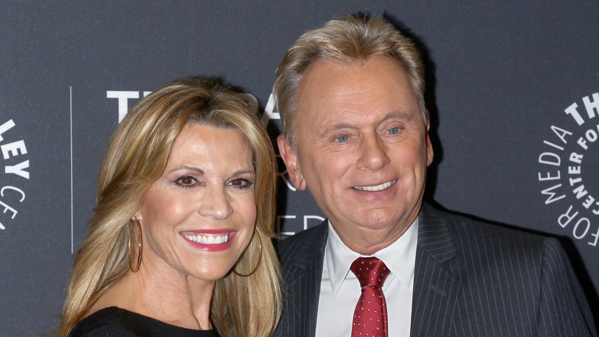 Vanna White and Pat Sajak at an event