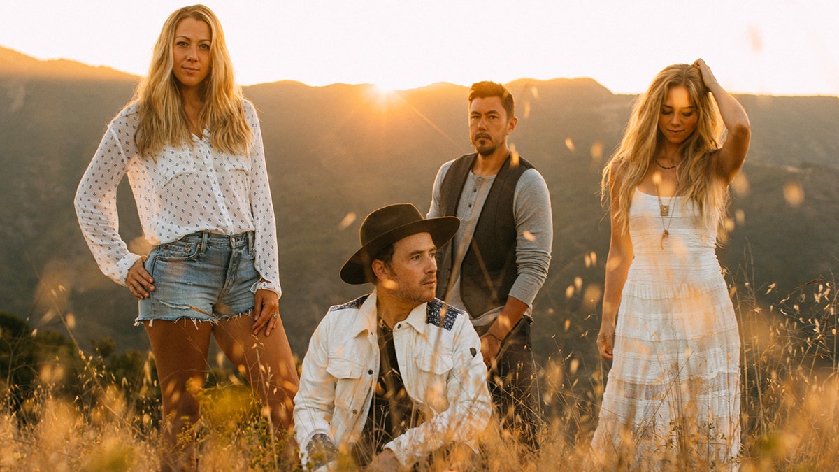 Country-rock band, Gone West, pictured, is comprised of Colbie Caillat, left, Jason Reeves and Justin Young, center, and Nelly Joy, right.