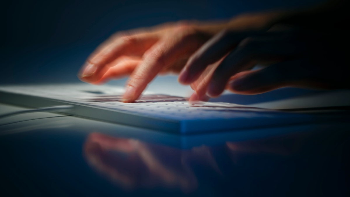 File photo illustration -hands write on a computer keyboard on August 28, 2019 in Berlin, Germany.