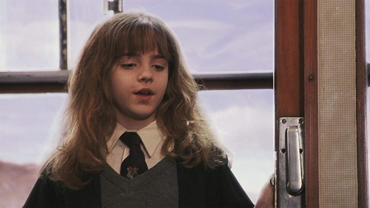 Young Emma Watson as Hermione Granger.