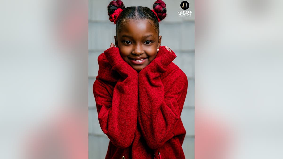 Marian Scott, 8, was all smiles during a recent, personalized photoshoot with Jermaine Horton Photography.