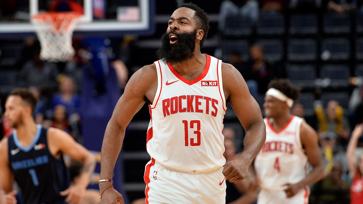 Houston Rockets guard James Harden (13) reacts after scoring a three-point basket in the second half of an NBA basketball game against the Memphis Grizzlies, Monday, Nov. 4, 2019, in Memphis, Tenn. (AP Photo/Brandon Dill)