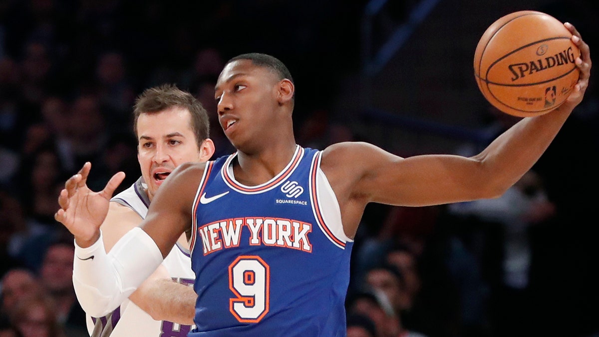 Sacramento Kings forward Nemanja Bjelica (88) defends New York Knicks guard RJ Barrett (9) during the first half of an NBA basketball game in New York, Sunday, Nov. 3, 2019. (AP Photo/Kathy Willens)